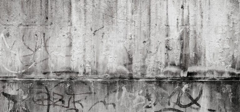 Grey-and-black-graffiti-on-wall to be removed