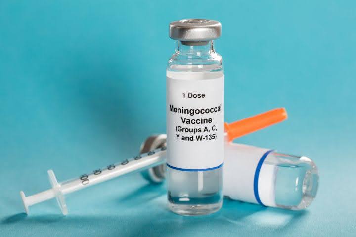 A close-up image showing a syringe and meningococcal vaccine, illustrating the key prevention method against meningococcal disease
