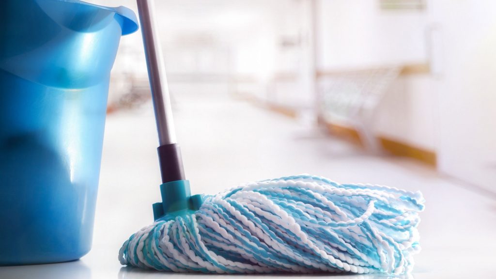 Close up of a mop and bucket